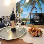 In With Seaview, Terrace, Air Condition, Wifi Mundanije